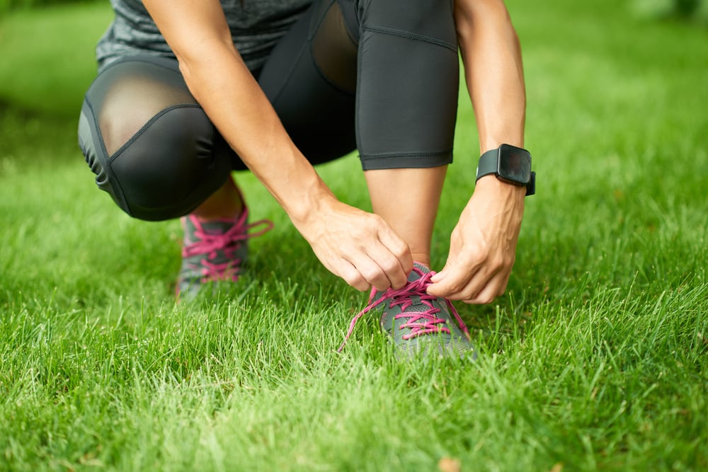 Two mature women keeping fit by together